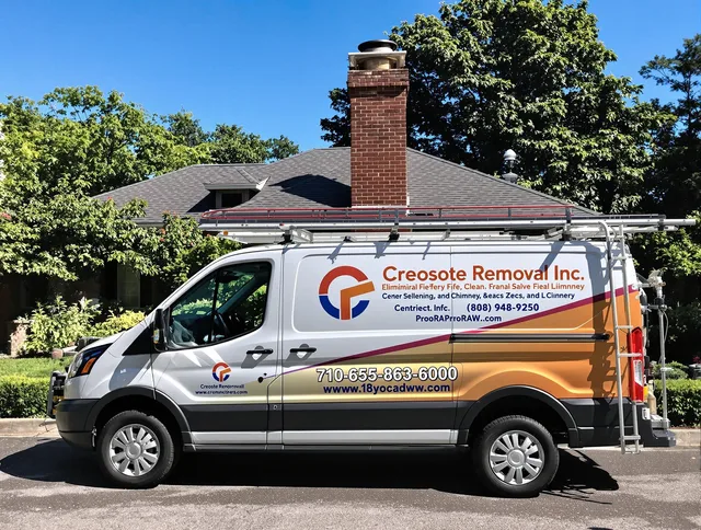 Rehoboth Chimney Sweep technician removing creosote safely in Rehoboth, MA